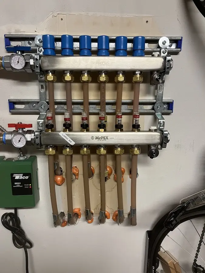 Plumber performing Water Heater Repair at a residential property in Westway